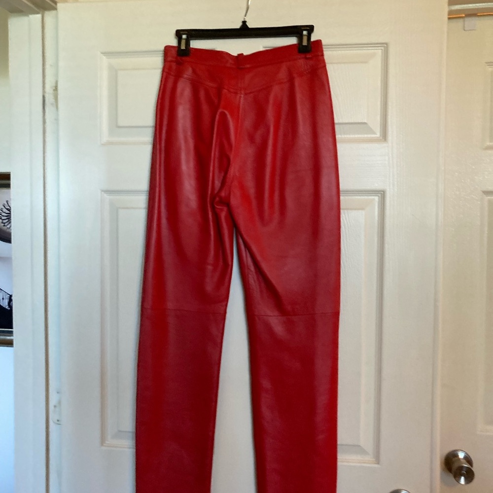 Vintage red leather jeans. Gently used. True to sizing